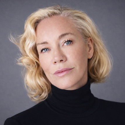 Headshot of Lara Love Hardin on a black background
